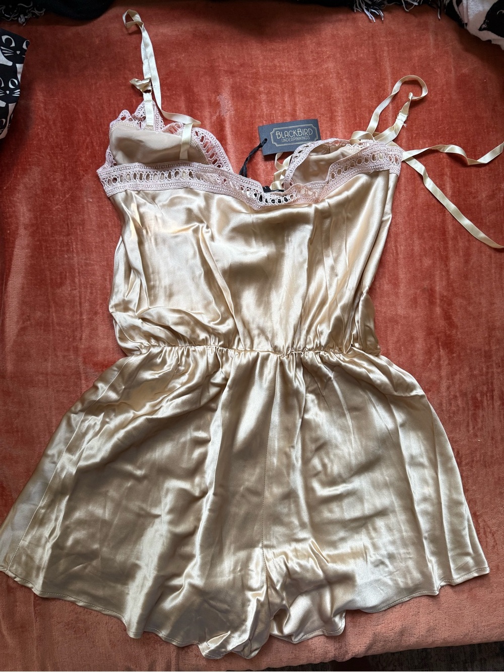 100% silk lace-trim chemise romper in champagne